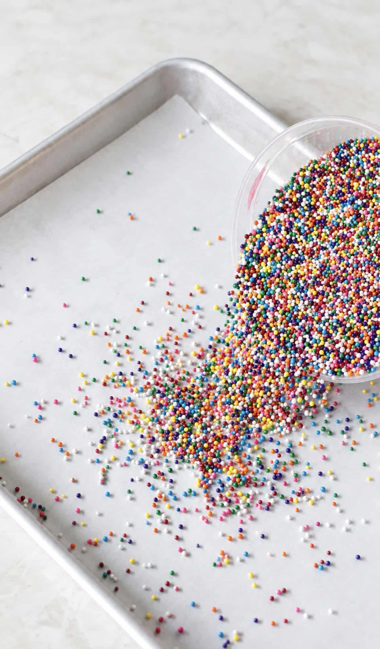 Sprinkles poured onto baking sheet.