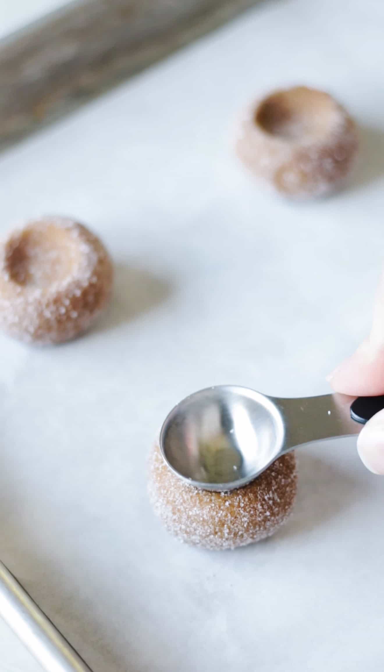 Teaspoon pressed into cookie dough.