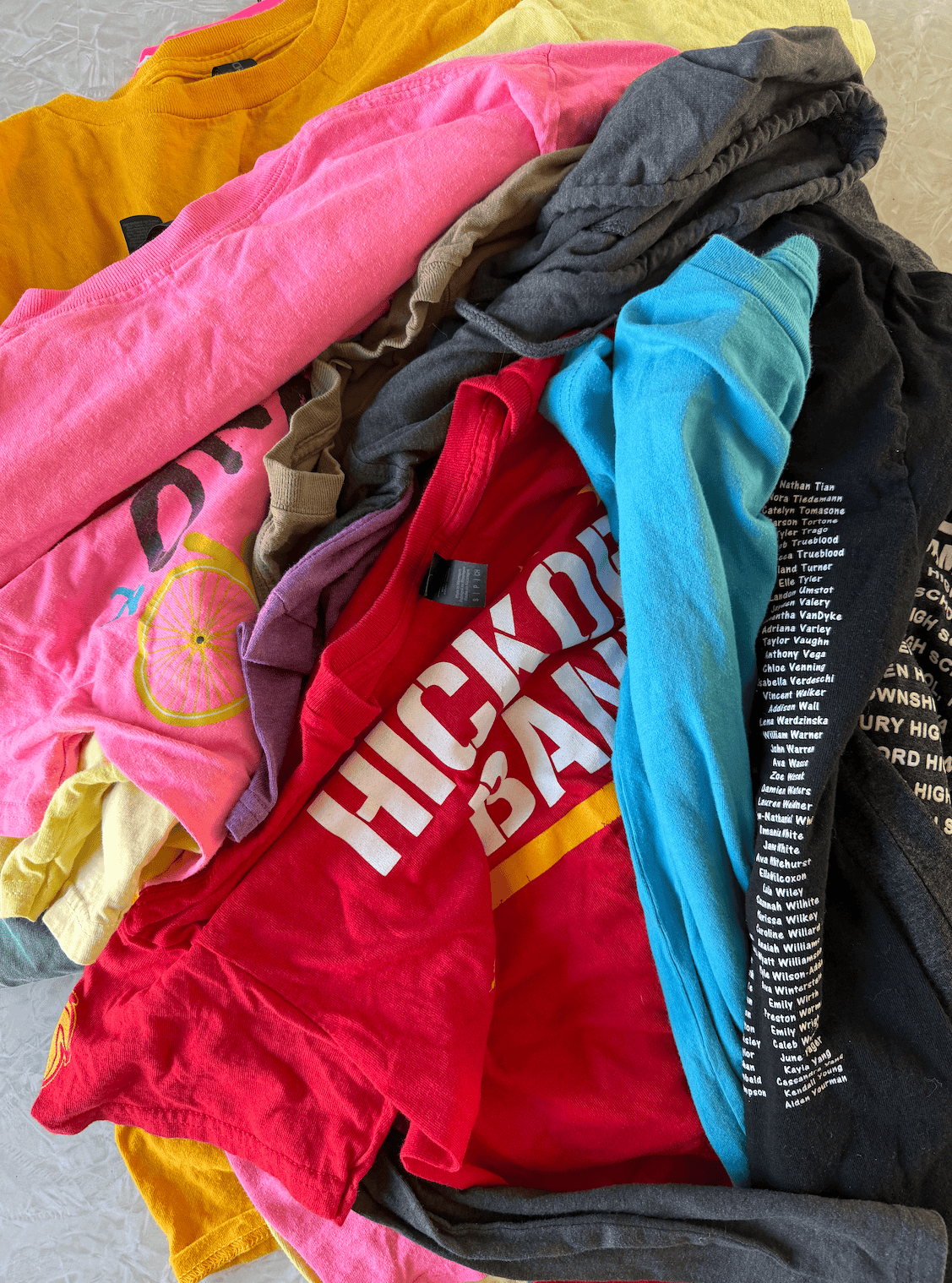 Pile of t-shirts.