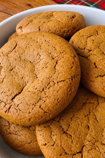 Gingerbread cookies on a white platter.
